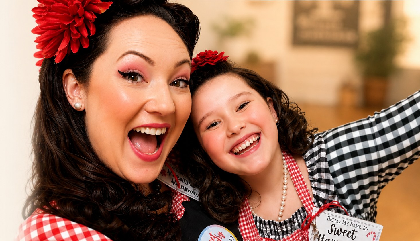 Mother and daughter in red gingham aprons at the farm stand